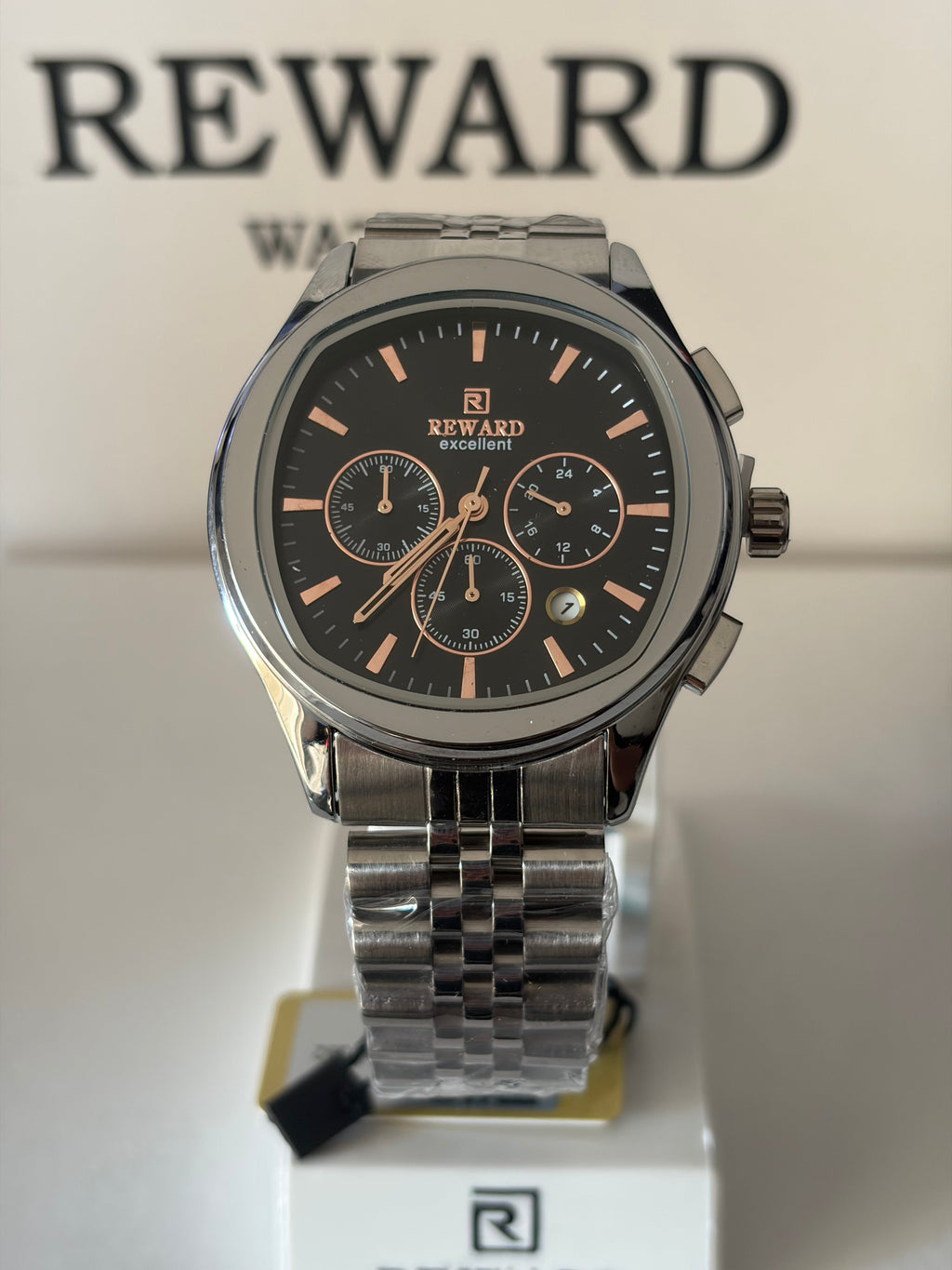 Reward Watches Maestro Noir Argent stainless steel chronograph watch with black dial and rose gold accents.